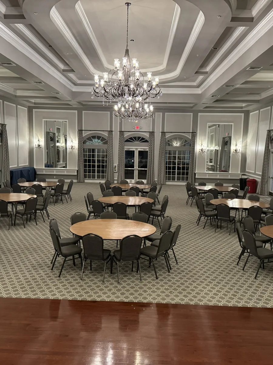 Clubhouse room with polished floor after commercial cleaning