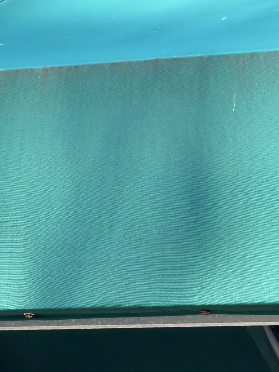 Pool screen enclosure trim cleaned after soft washing