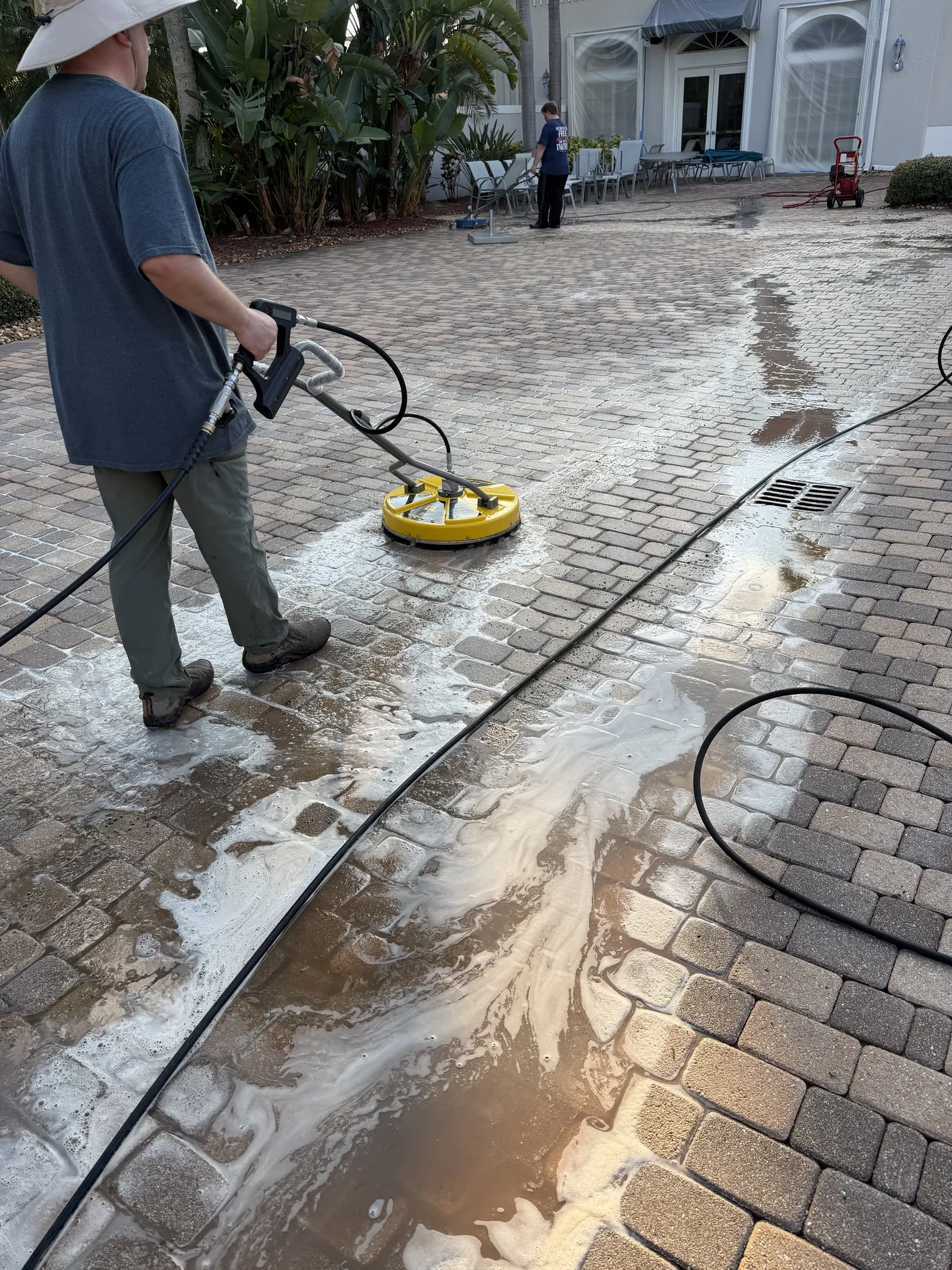 Pressure washed pool deck and exterior surface in Estero, Florida